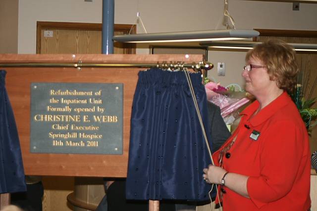 Chief Executive Christine Webb with the plaque unveiled in her honour