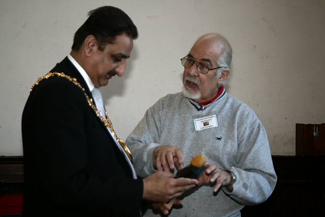 The Mayor of Rochdale talking to a member of the Lancashire and Cheshire Woodcarvers 