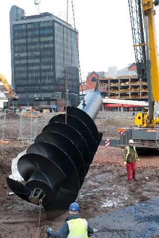 The screw being put into place