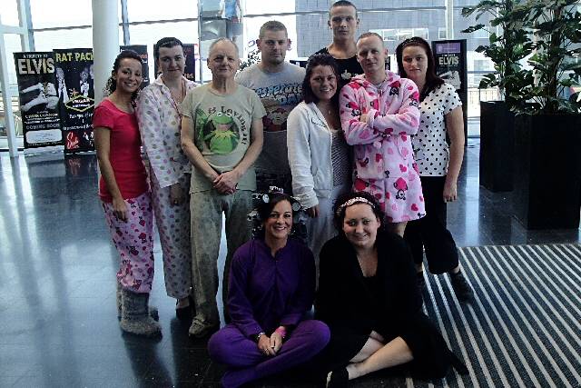 Staff and Middleton Heartline members in their pyjamas