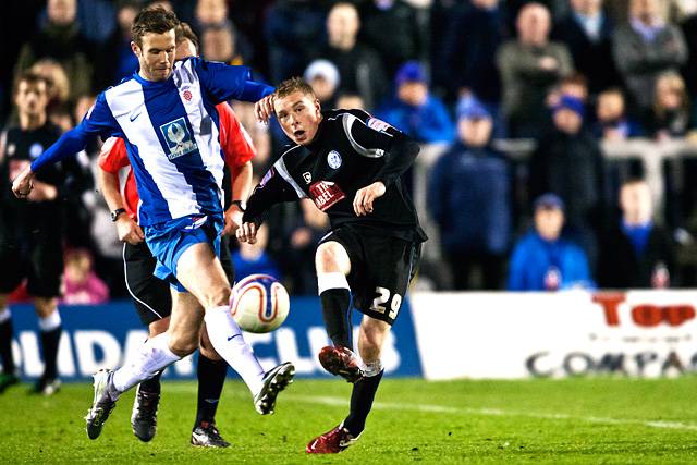 Hartlepool United 0 - 2 Rochdale<br />Andy Monkhouse challenges Nicky Adams