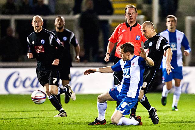 Hartlepool United 0 - 2 Rochdale<br />Joe Gamble with Gary Jones challenging