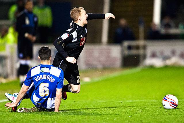 Hartlepool United 0 - 2 Rochdale<br />Evan Horwood with a foul on Nicky Adams that brought him a caution