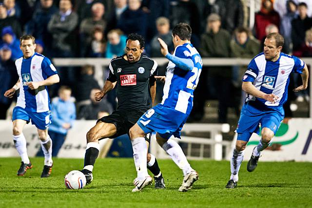 Hartlepool United 0 - 2 Rochdale<br />Chris O'Grady challenged by Peter Hartley