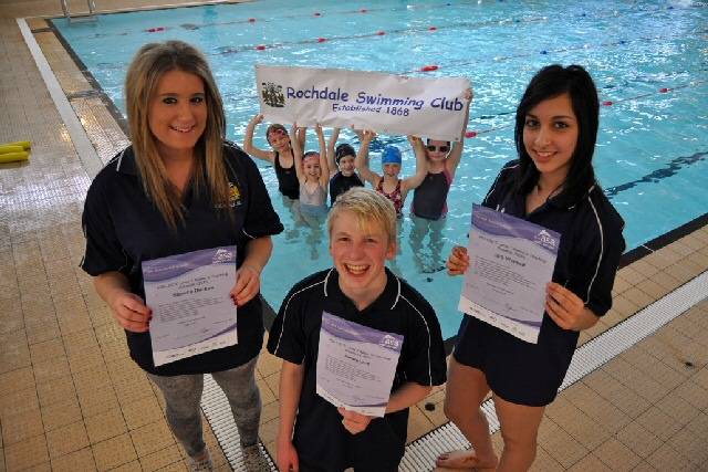 Stascha Redkwa, James Lord, Iqra Waheed with swimming club members