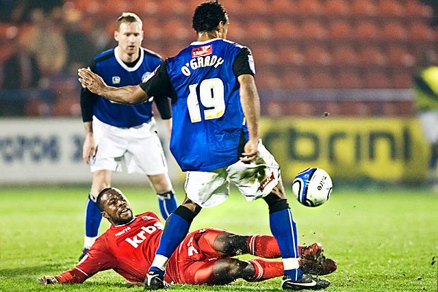 Rochdale 2 - 0 Charlton Athletic<br />Joe Anyinsah slides in to tackle Chris O'Grady