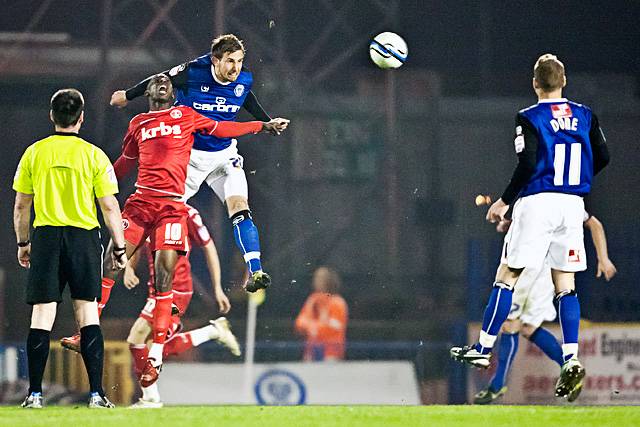 Rochdale 2 - 0 Charlton Athletic<br />Craig Dawson beats Bradley Wright-Phillips with a powerful headed clearance