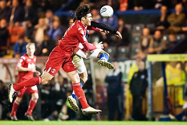 Rochdale 2 - 0 Charlton Athletic<br />Miguel Angel Llera and Jean Louis Akpa-Akpro challenge in the air