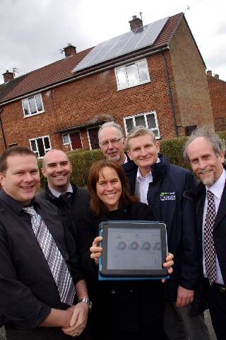 Partners at Retrofit house with monitoring software - Phil Treaton (Groundwork), Barry Simons (Rochdale Council), Teresa Jennings (Groundwork), John Hall (AlternEnergy), Andy Moloney (AlternEnergy), Paul Roberts (Rochdale Council). 
