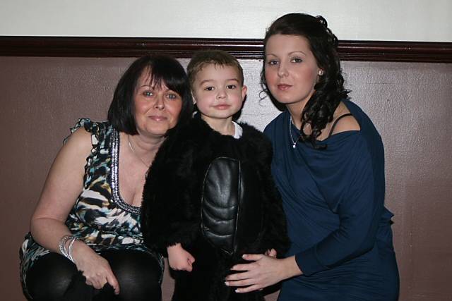 Riley (centre) with his Nana, Debbie, and mum, Stacey