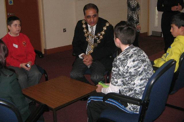 The Mayor of Rochdale, Councillor Zulfiqar Ali, talks to young people about the Strengthening Families Programme
