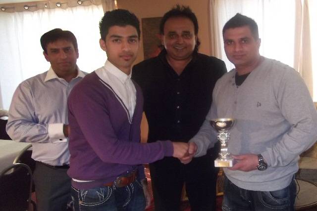 Adil receiving Young Player of the League award