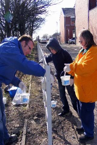 Paul Howes Groundwork with residents Jordan and Jackie lending a hand at the Community Action Day