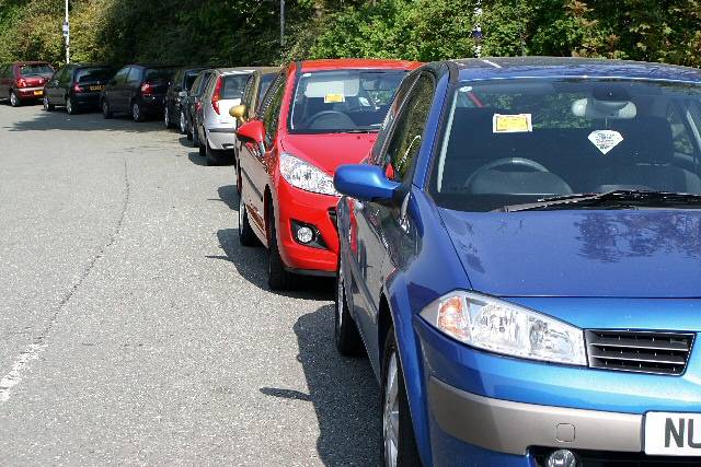 Cars with parking tickets at Castleton Train Station