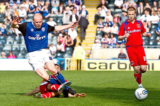 Rochdale 2 - 3 Carlisle United<br \>Gary Jones feels a hard tackle