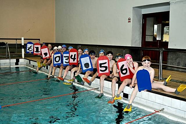 Flipping fantastic - members of the Rochdale Swimming Club raised over £1,000