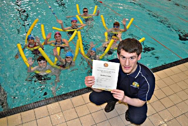 Matthew Lees with swimmers at the club