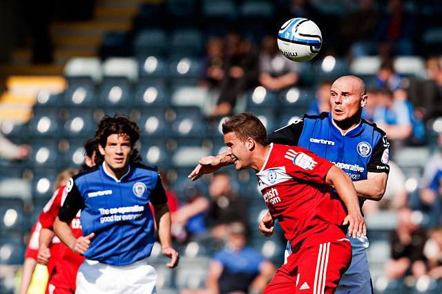 Rochdale 2 - 2 Peterborough United<br />Gary Jones wins the aerial battle