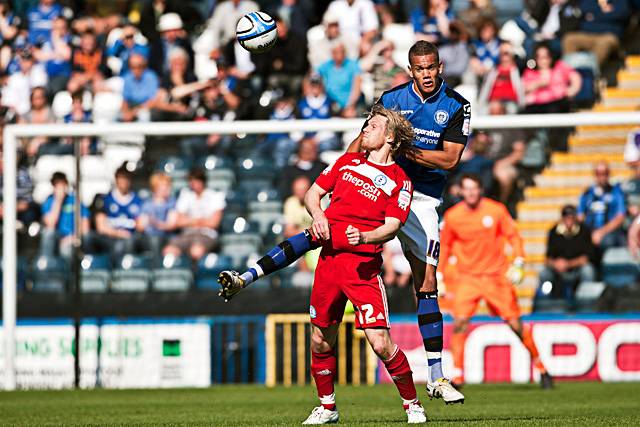 Rochdale 2 - 2 Peterborough United<br />Josh Thompson outjumps Craig Mackail-Smith