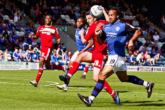 Rochdale 2 - 2 Peterborough United<br />Chris O'Grady tussles with Chris Whelpdale