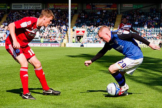 Rochdale 2 - 2 Peterborough United<br />Nicky Adams takes on Ryan Bennett