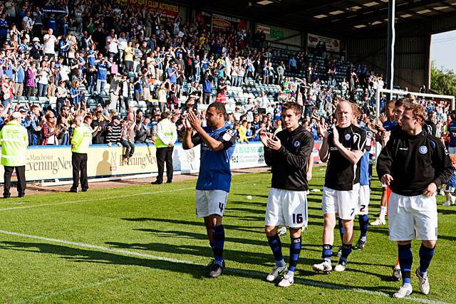 The Dale players do a lap of honour