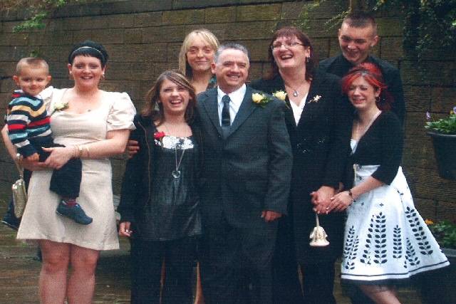 Nigel and Gail Lindley with their family on their wedding day