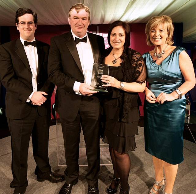 Jackson, Jackson & Sons collects the SME of the year award from Lucy Meacock at the Regional Construction Awards