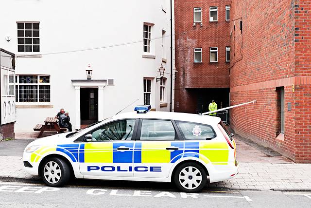 Police at the crime scene on Saturday (28 May) morning