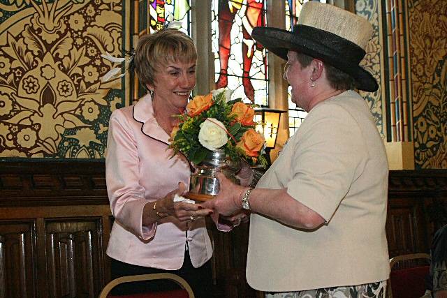 Anne Needham being presented with the award by last year’s winner Sue Ridgard.