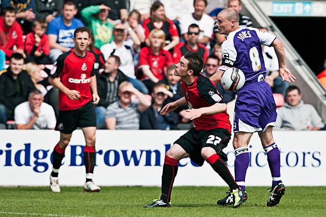 Bournemouth v Rochdale<br />Gary Jones wins a header