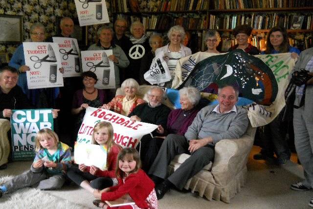 Some of those present with ‘Cut Trident not jobs, health, education’ placards and some of the group’s banners