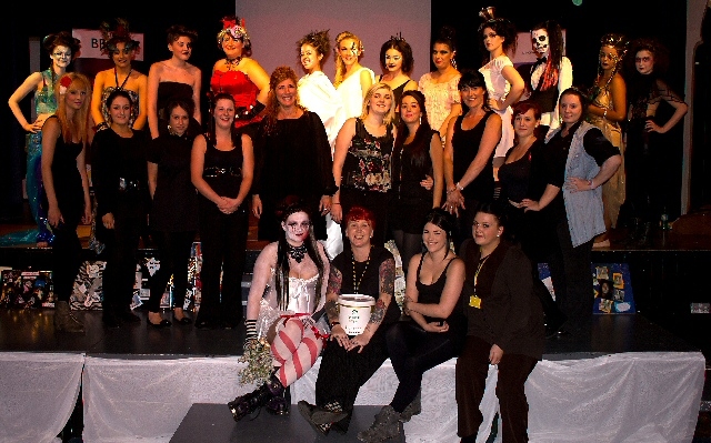 The students with their models at the show