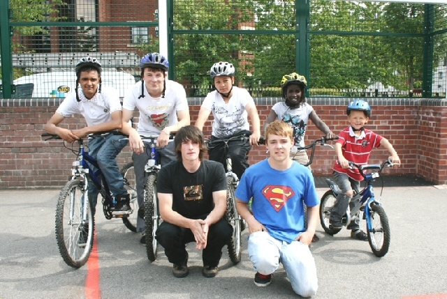 The new owners of the bicycles back row, from left to right: Irfan Qaiser, Aaron Whitehead, Cree Hulme, Aissata Ndiome and Taylor Biggins with the bicycle repairers, front left, Toby Werhun, volunteer working with the youth offending team and Kamen Strand