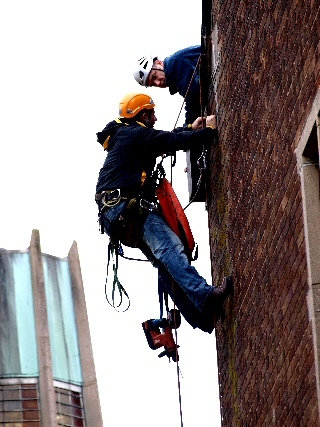 Abseilers installing bat boxes at Hopwood Hall College