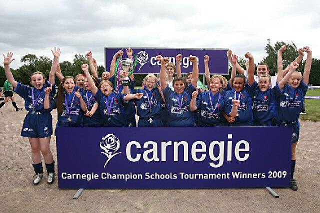 The girls pictured after winning the 2009 National Final.