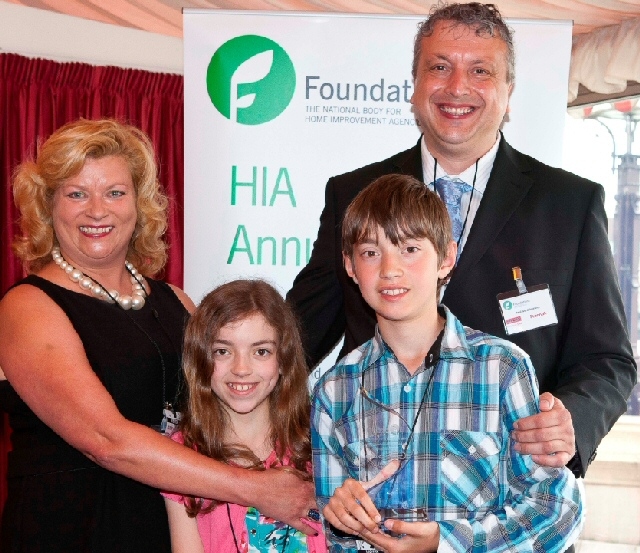 Paul Gordziejewicz, Head of the Rochdale Home Improvement Agency, celebrates the award with his wife Angela, son George and daughter Anastazia.