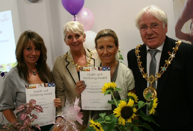 Staff from Gregory Couzens in Rochdale receive their certificates from the Mayor Councillor Alan Godson and Mayoress Ms Gillian Brown.

