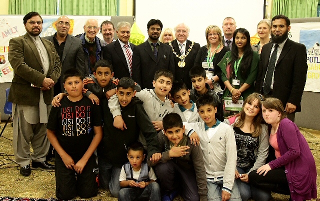 Young people with Mayor Godson at the celebration event. 