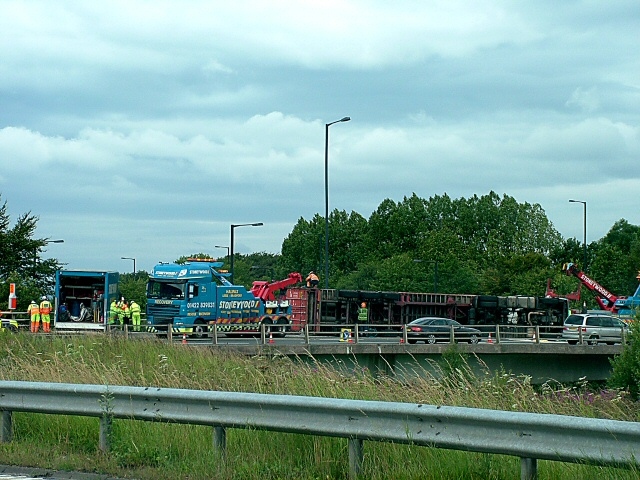 The overturned lorry on the A627 roundabout. Photo courtesy of Rochdale Online reader Jason Addy