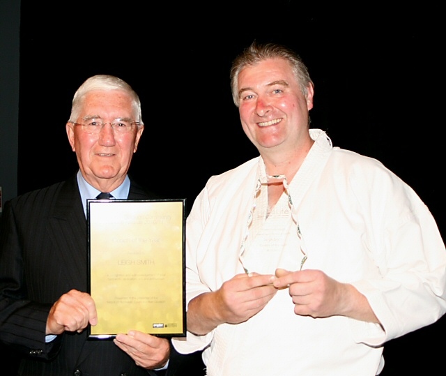 Link4Life Chairman Brian Ashworth presenting the Coach of the Year Award to Leigh Smith