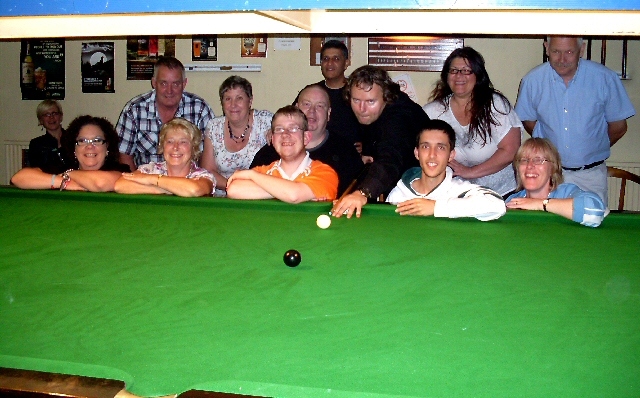 Paul Marshall (centre) surrounded by supporters, sponsors and players