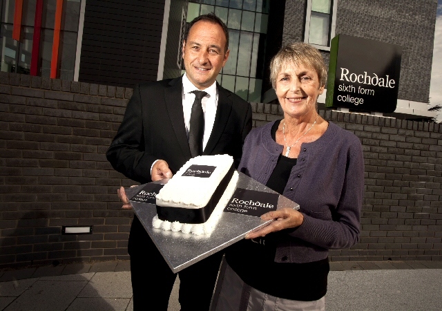 Rochdale Sixth Form College's Principal Julian Appleyard and Chairwoman of the governing body, Dame Pamela Coward, with a first birthday cake