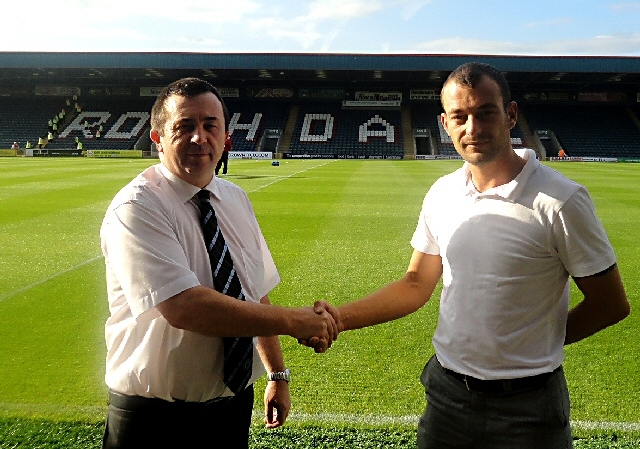 The Chief Executive of Rochdale Football Club, Colin Garlick with Dean Connaughton, Community Fundraiser from Springhill Hospice