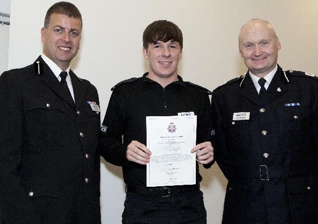 Jordan Risdale (centre) with Special Constabulary Chief Officer Paul Whittham and Assistant Chief Constable Terry Sweeney.