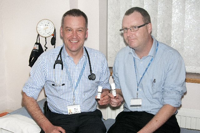 Sam Jole, Senior Research Nurse, and Dr Iain Lawrie seen holding the Sativex®   spray