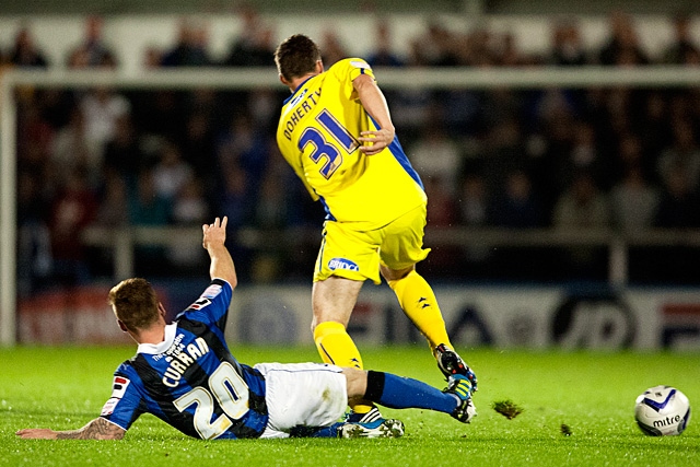 Doherty evades Craig Curran's sliding tackle