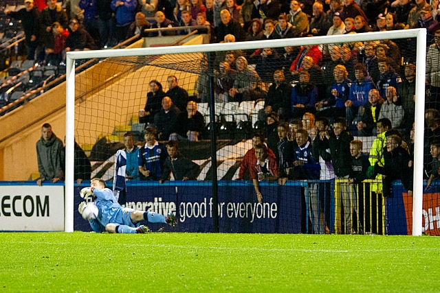 Smith saves but can't hold Schumacher's penalty - Schumacher pounced on the loose ball to score Bury's equaliser