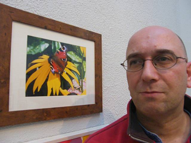 Regular exhibition, Paul Whitesman with his photograph ‘Butterfly’, taken in his mother’s garden near Kingsway