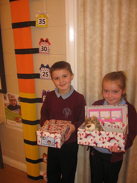 The children at St John with St Michael Primary School in Shawforth are holding a cake bake to raise funds to pay for the postage of filled shoe boxes for The Samaritans Purse Operation Christmas Child Charity